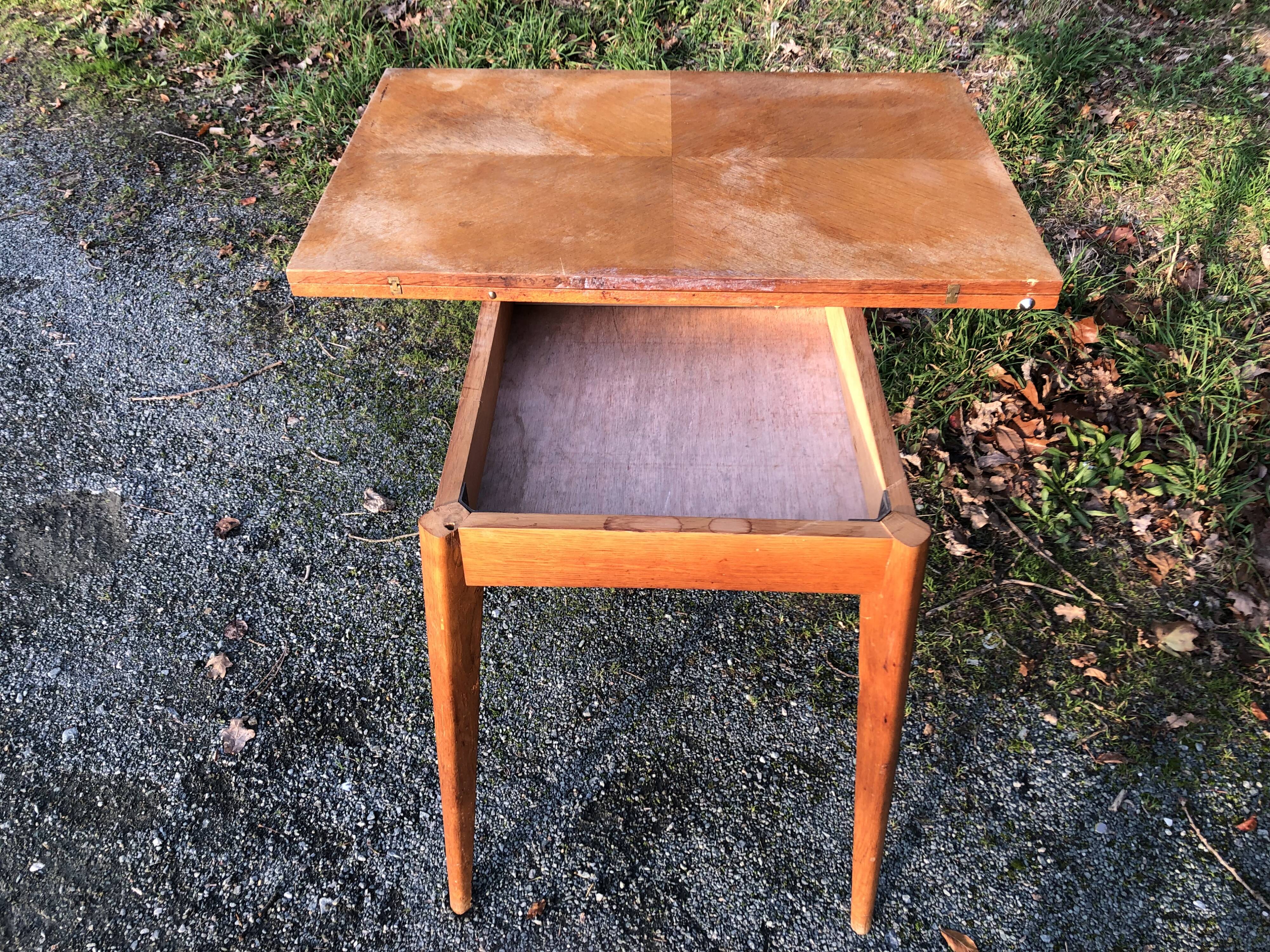 Vintage so-called portfolio table with oak compass base and its oak cp swivel top.