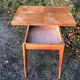 Vintage so-called portfolio table with oak compass base and its oak cp swivel top.