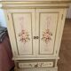 2-door flowered wooden cabinet