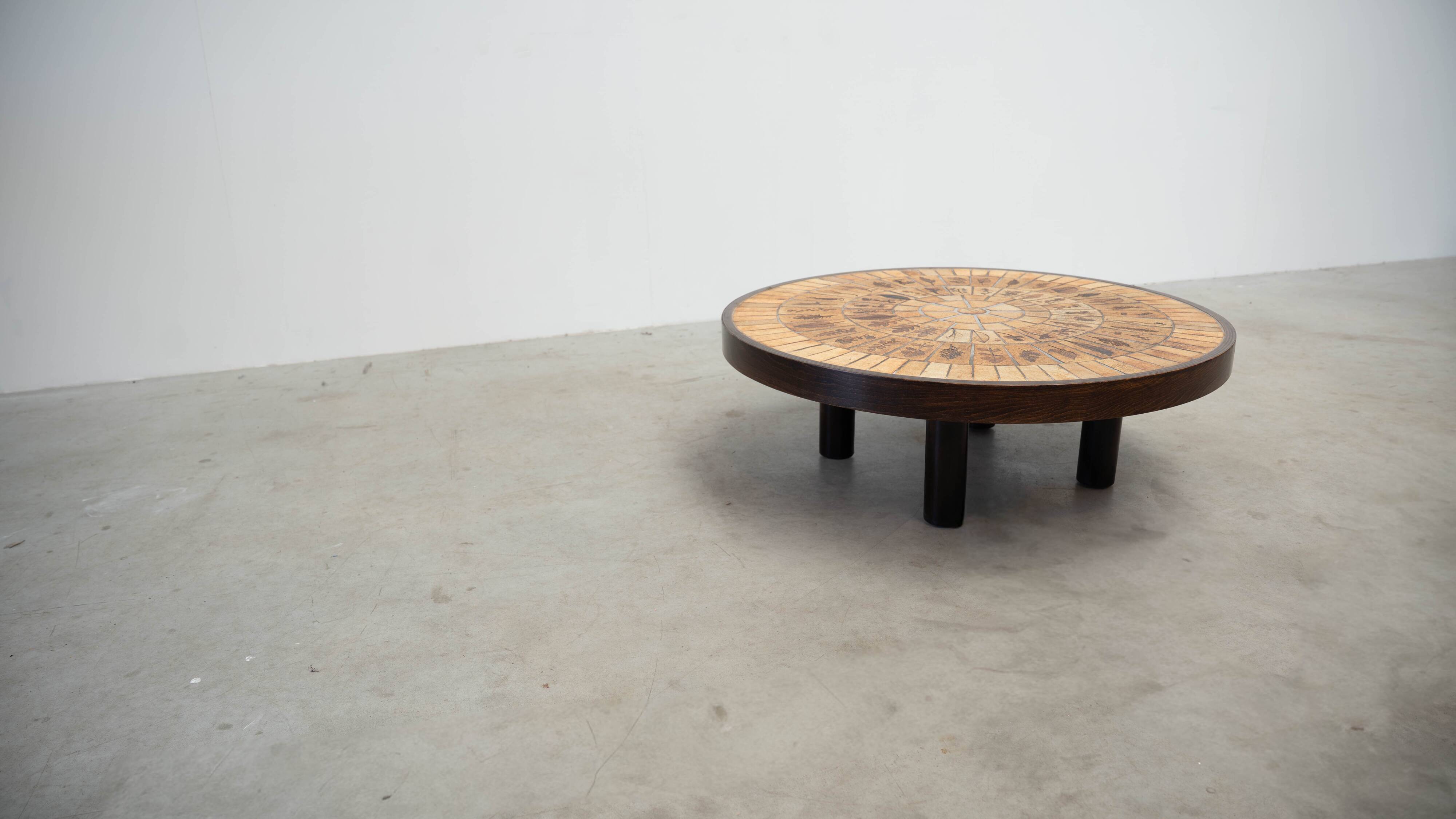 Round coffee table by Roger Capron