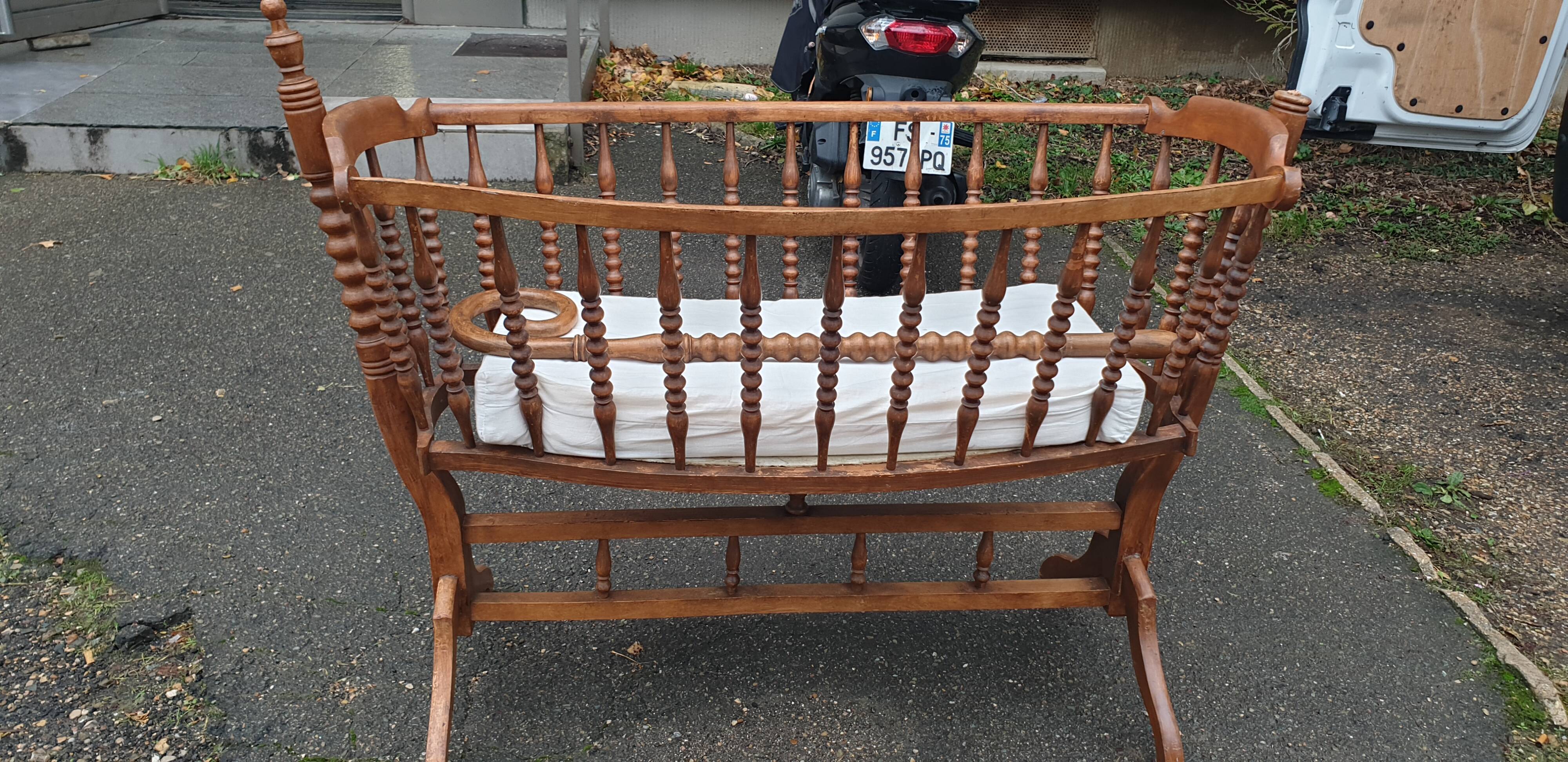 Turned wooden cradle half 20th century