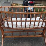 Turned wooden cradle half 20th century