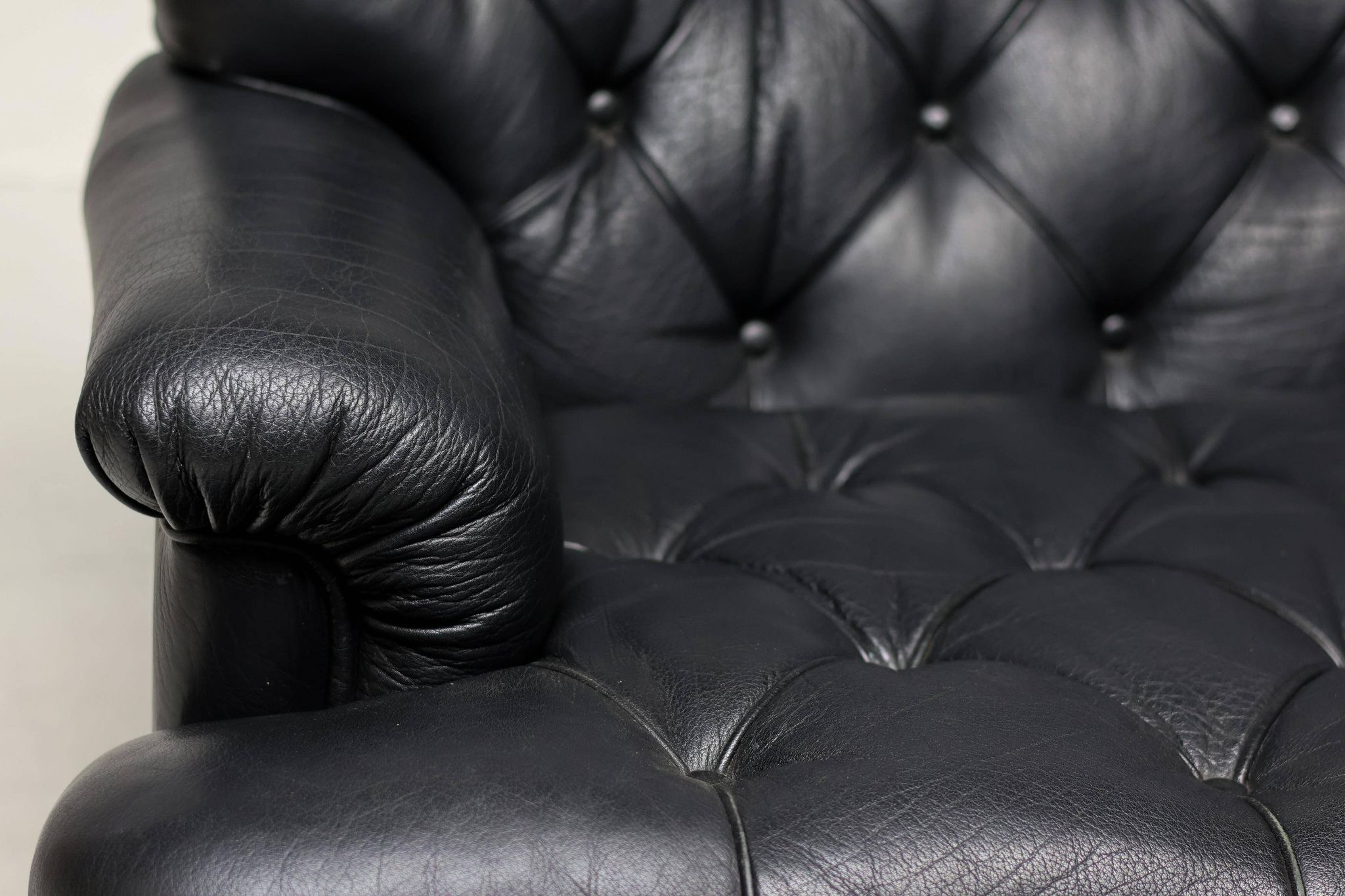 Three-seater sofa "Jupiter" in black leather by Arne Norell, Sweden, 1960.