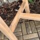 Art Deco farmhouse table made of raw wood.
