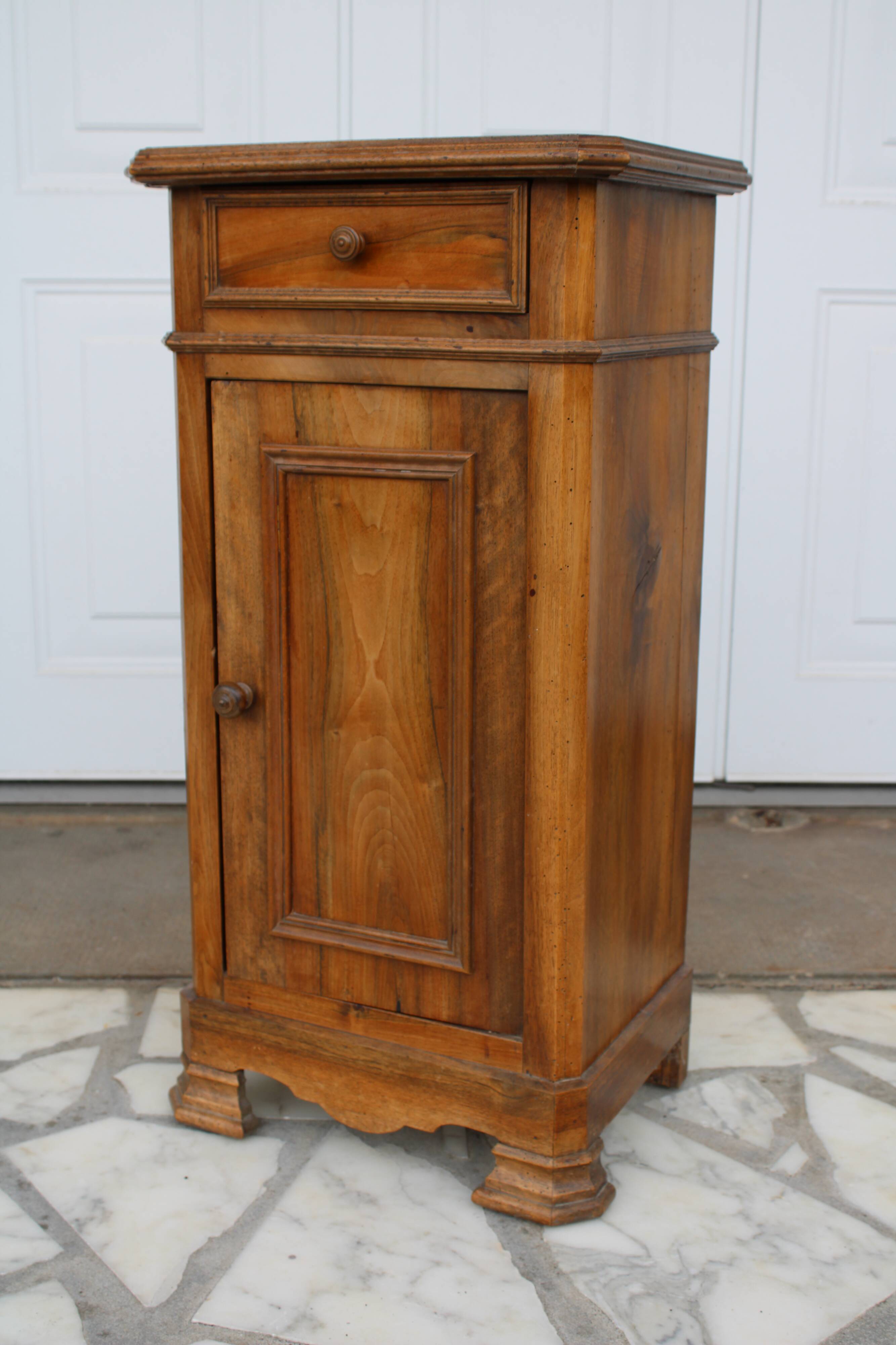 Antique bedside table with marble top