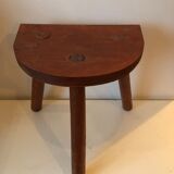 Old wooden tripod stool