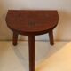 Old wooden tripod stool
