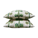 Custom cushions with green clover patterns.