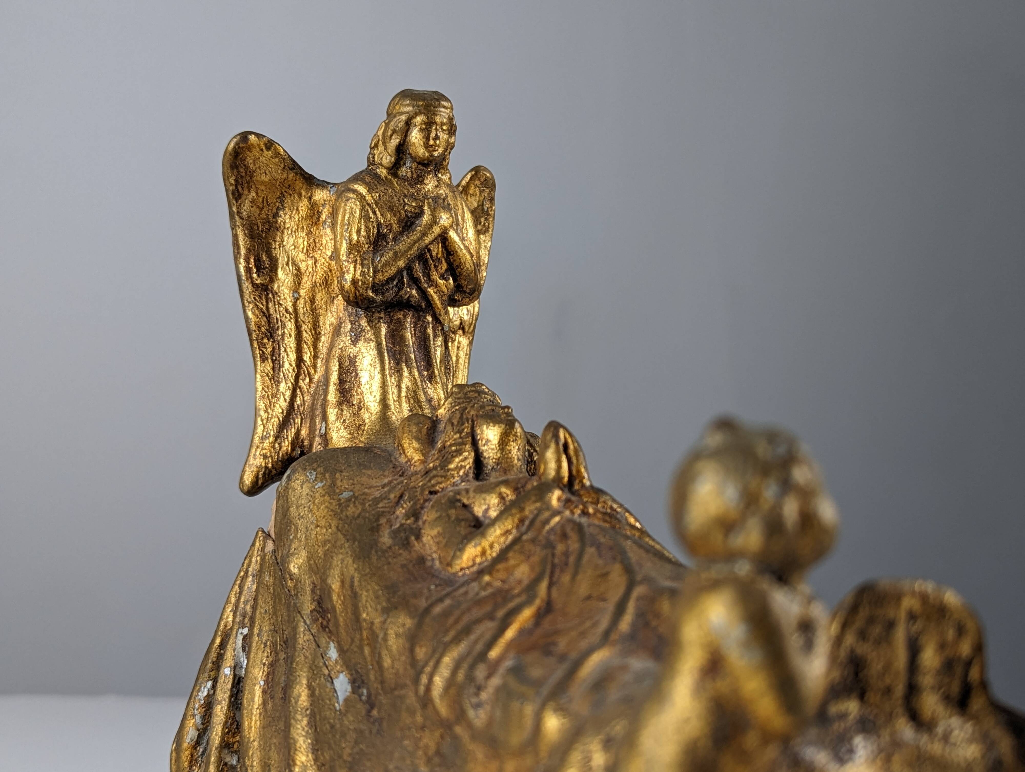 Queen and Angels sculpture in golden terracotta