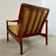 Old Scandinavian design armchair in vintage teak year 60