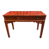 Red lacquer desk, Qing period of the XIXth century, opening to three drawers