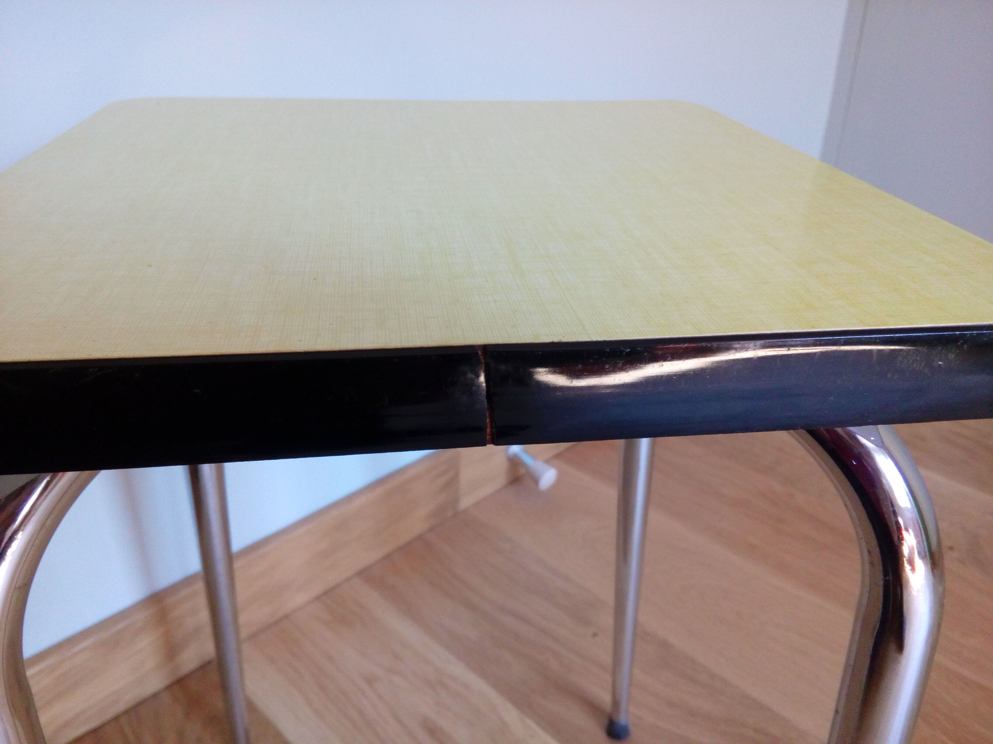 Yellow formica and chrome metal barstool
