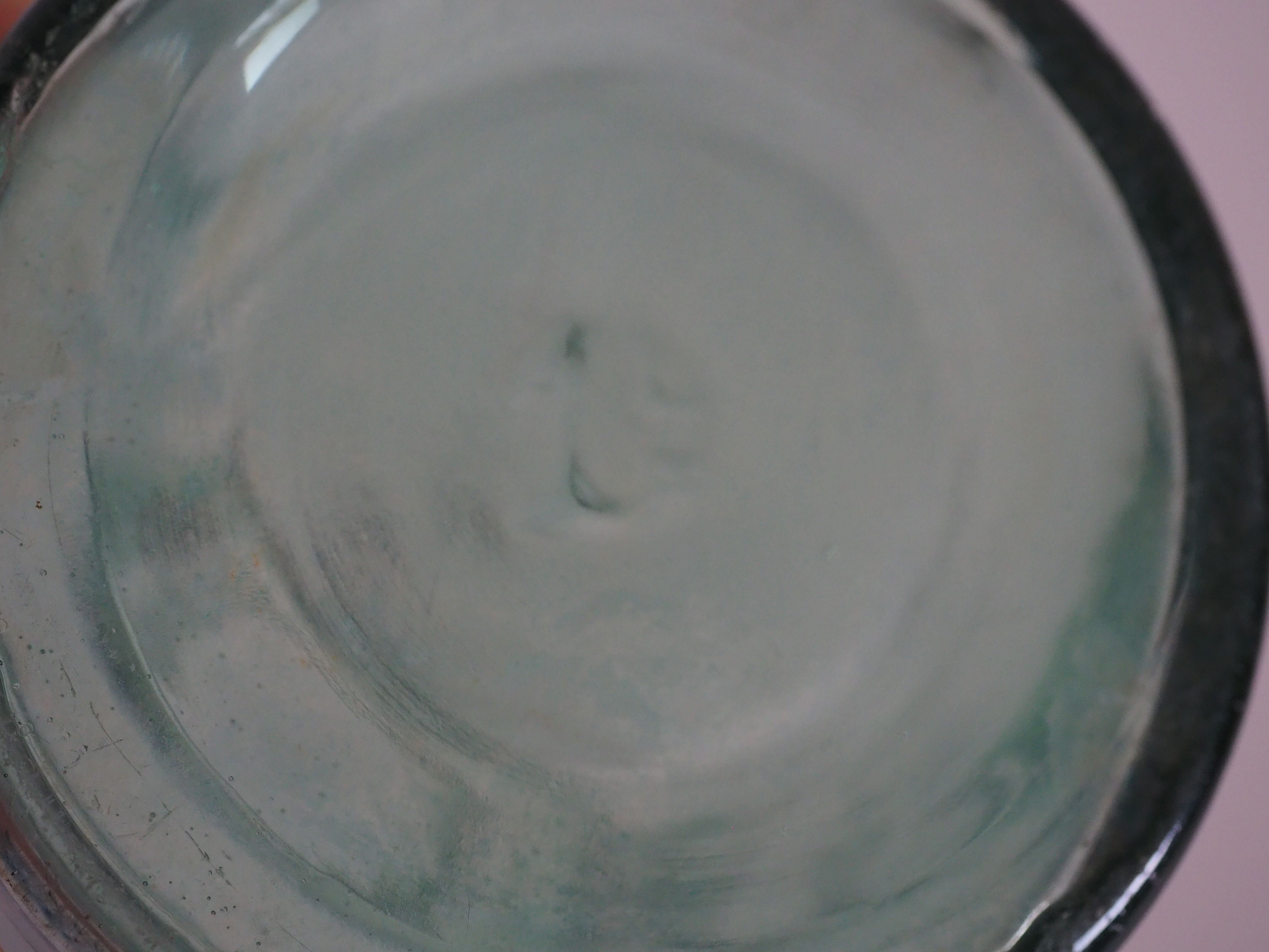 Green "ideale" glass canning jar