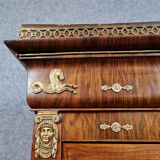 Louis Philippe period wardrobe (nineteenth) entirely covered with gilded bronzes