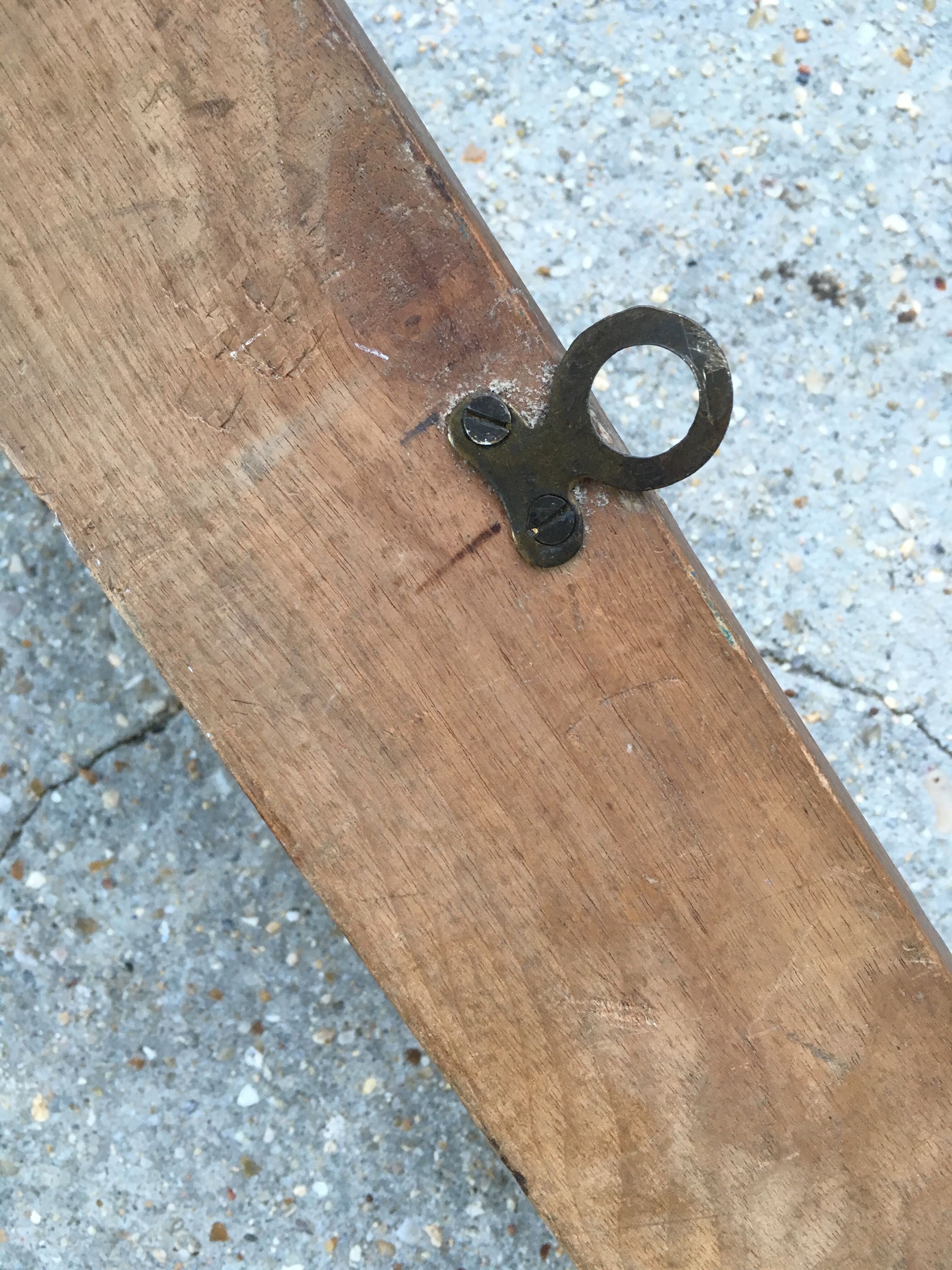 Wall hook from wood and brass