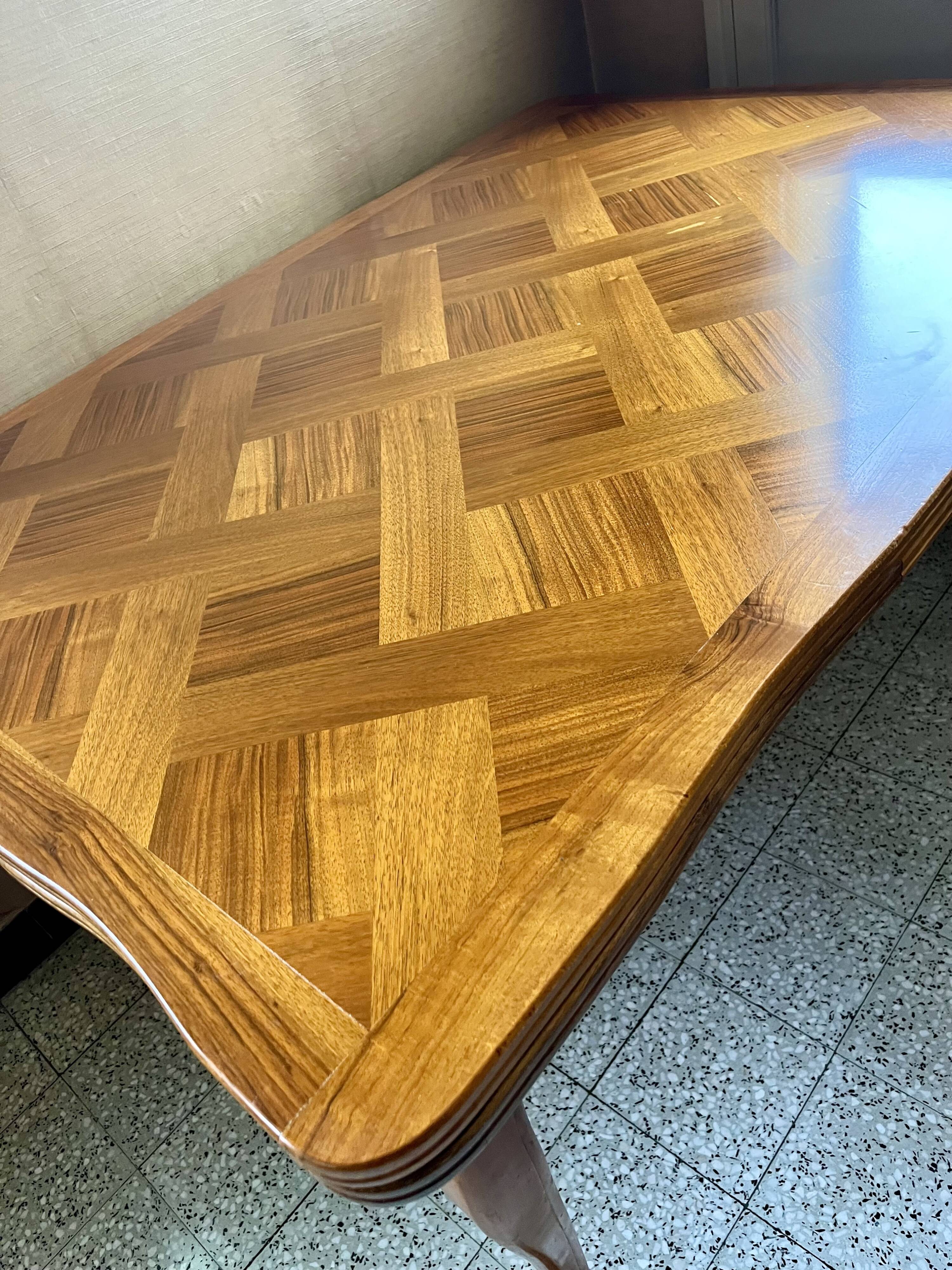 Dining table with extensions in Provençal style.