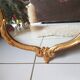 Miroir style Louis XV en bois sculpté doré 90x58cm