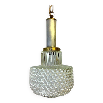Petite lampe suspendue en verre à clous de girofle.