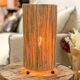 Cylindrical lamp in natural raffia