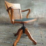 Antique office chair oak adjustable with green leather
