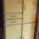 Yellow formica kitchen cabinet