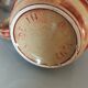 Coffee pot and mug cup in sandstone