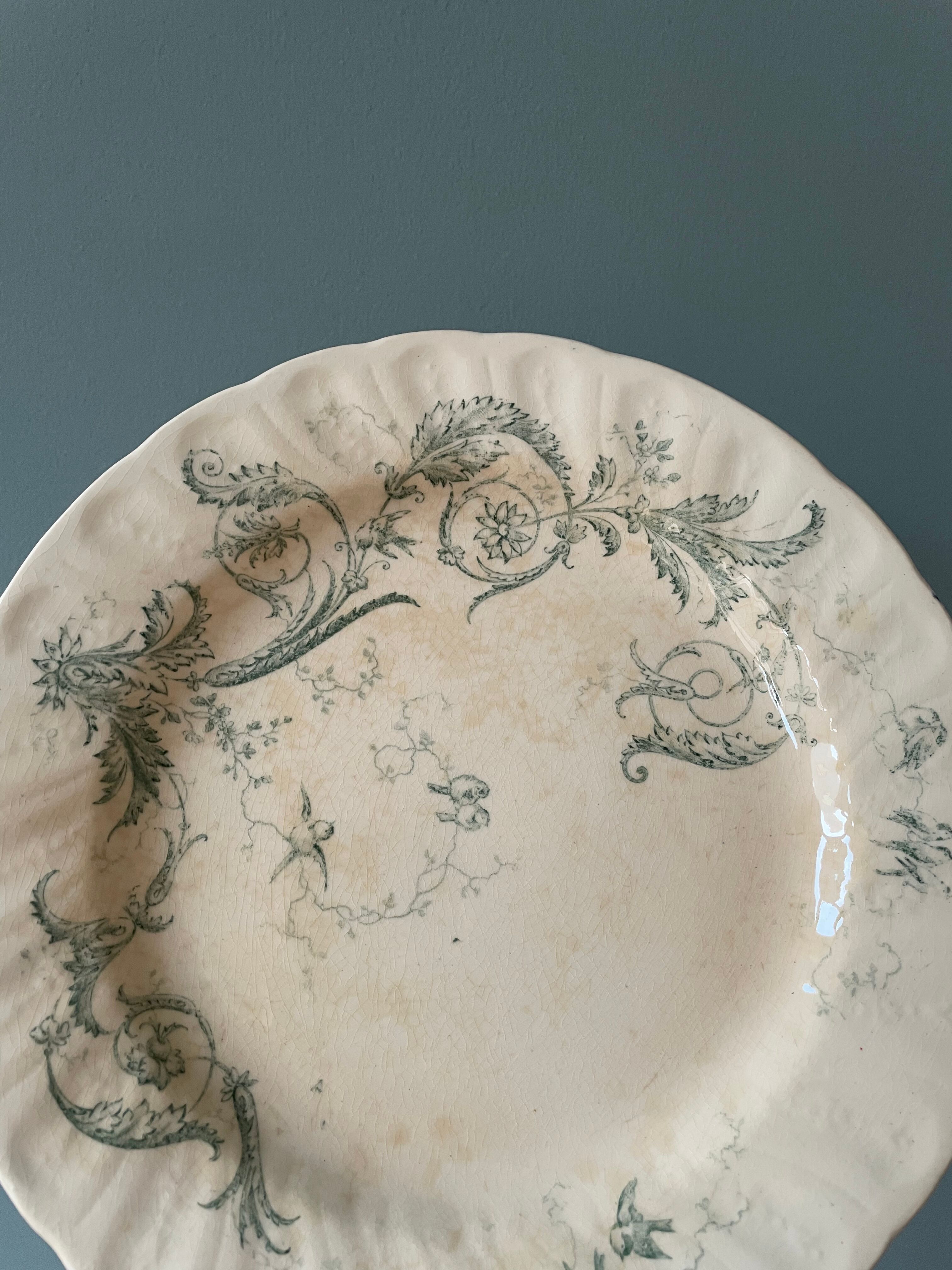 Set of 12 flat plates Terre De Fer XIXth in opaque porcelain of Gien, model Rinceaux
