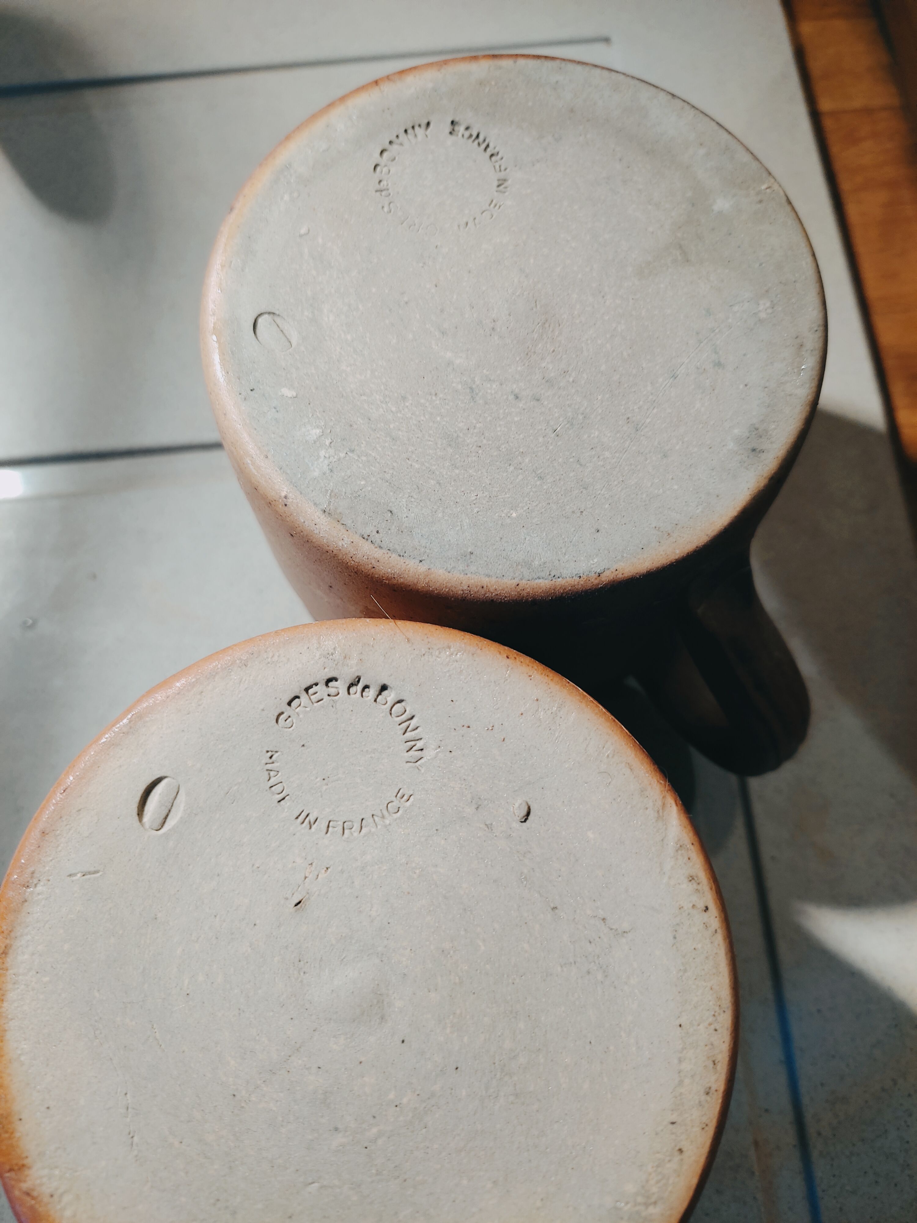 2 sandstone mugs