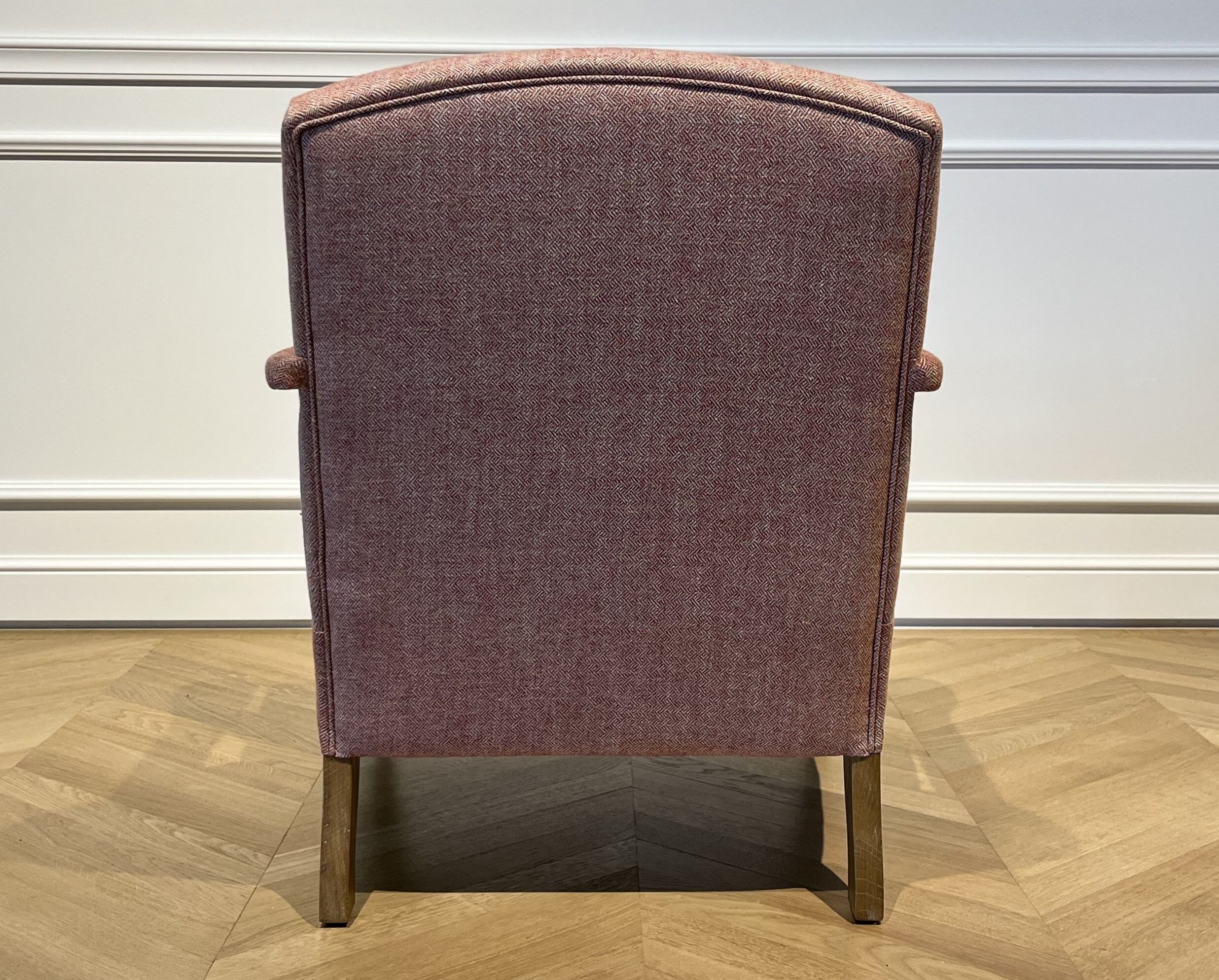 Wooden and red chevron fabric armchair with casters