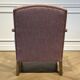 Wooden and red chevron fabric armchair with casters