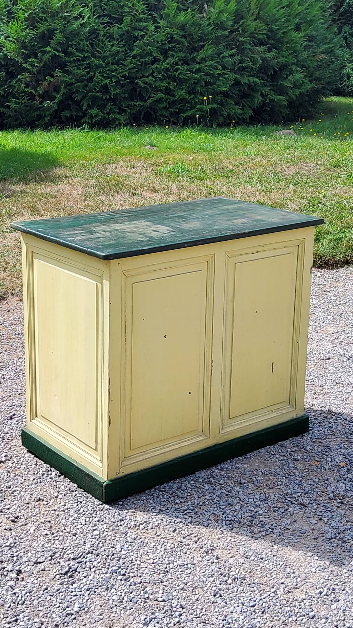Late 19th century grocery counter in green and yellow patina painted wood