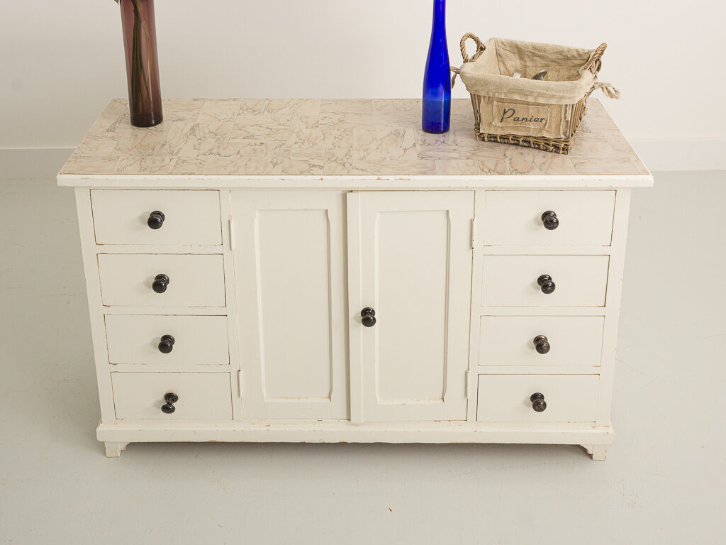 Small accent cabinet with drawers and swing doors