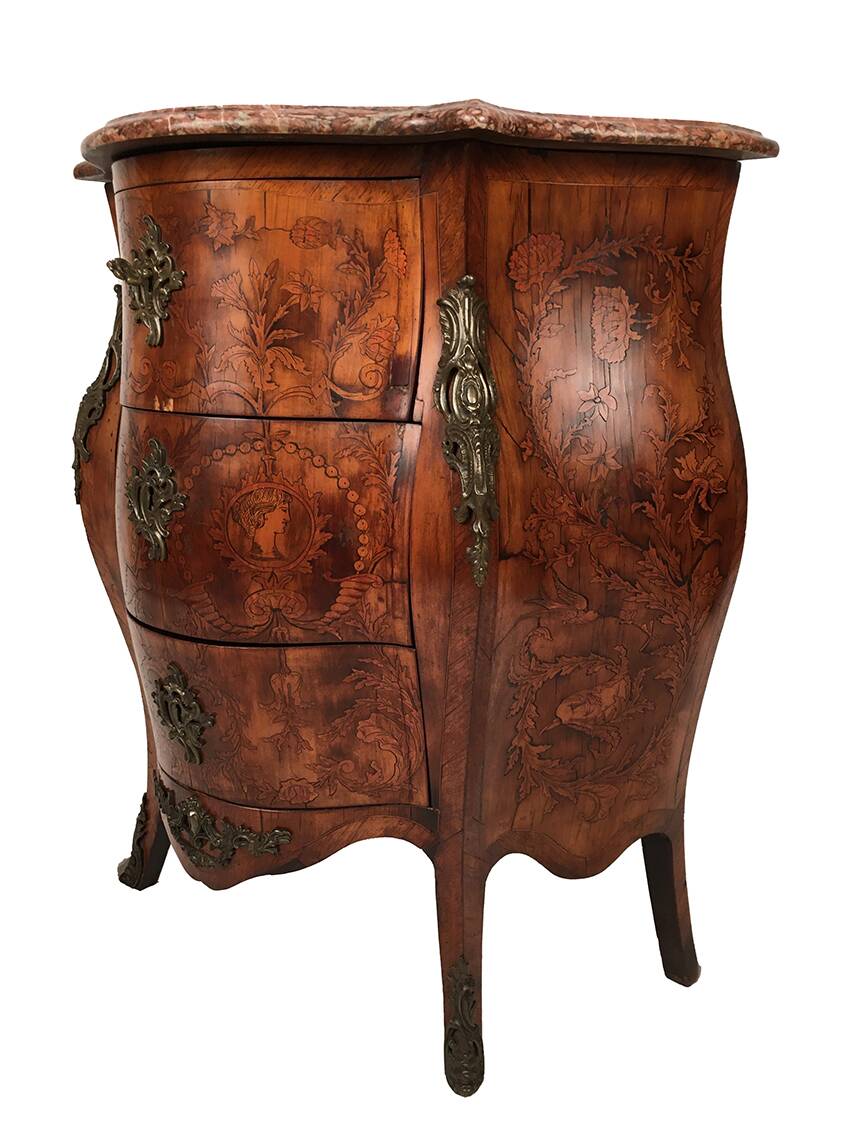 Louis XV style chest of drawers, richly inlaid, animated front and side. 19th century