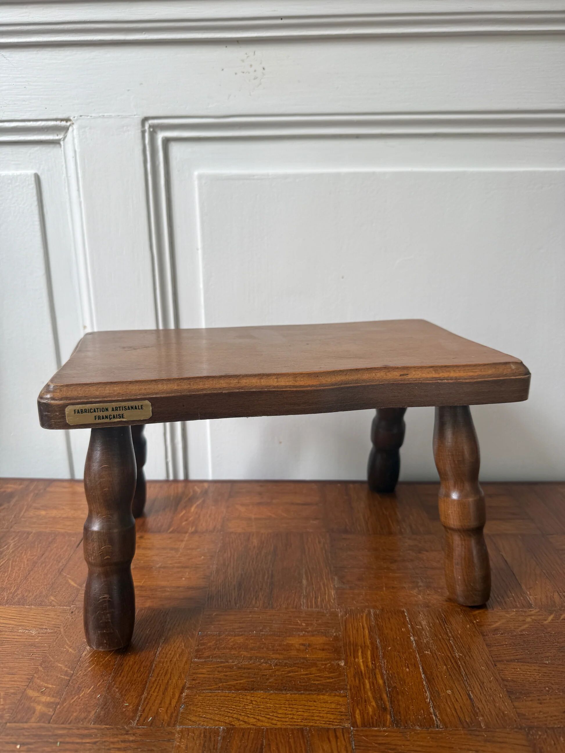 Old wooden milking stool