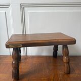 Old wooden milking stool