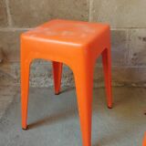 Pair of AMI stools in orange plastic