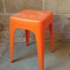 Pair of AMI stools in orange plastic