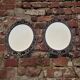 2 antique oval mirrors in heavy metal