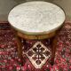Louis XVI style bouillotte table in mahogany with a white marble top.