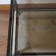 Table basse noire ,or et double plateau verre fumé