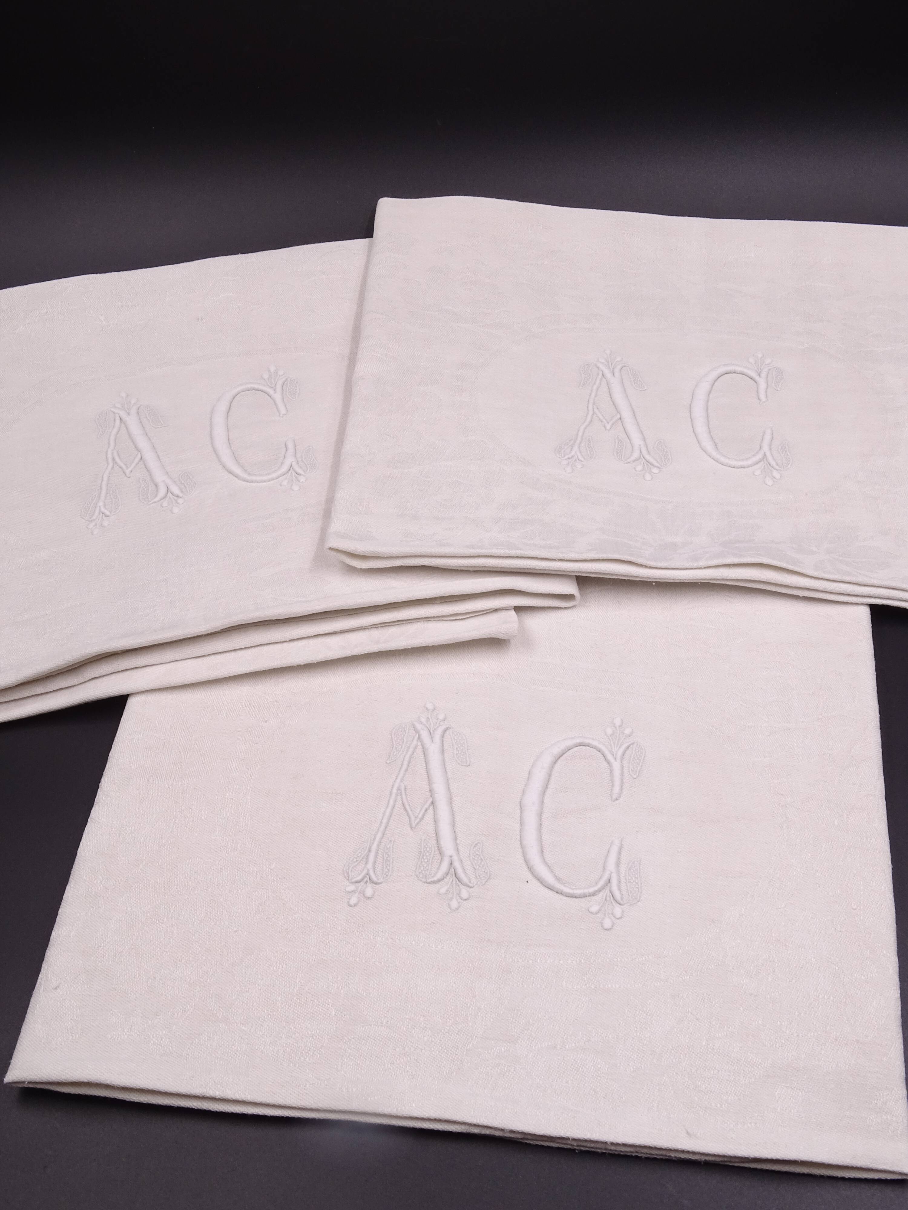 Set of 17 old damasked towels and monogram ac