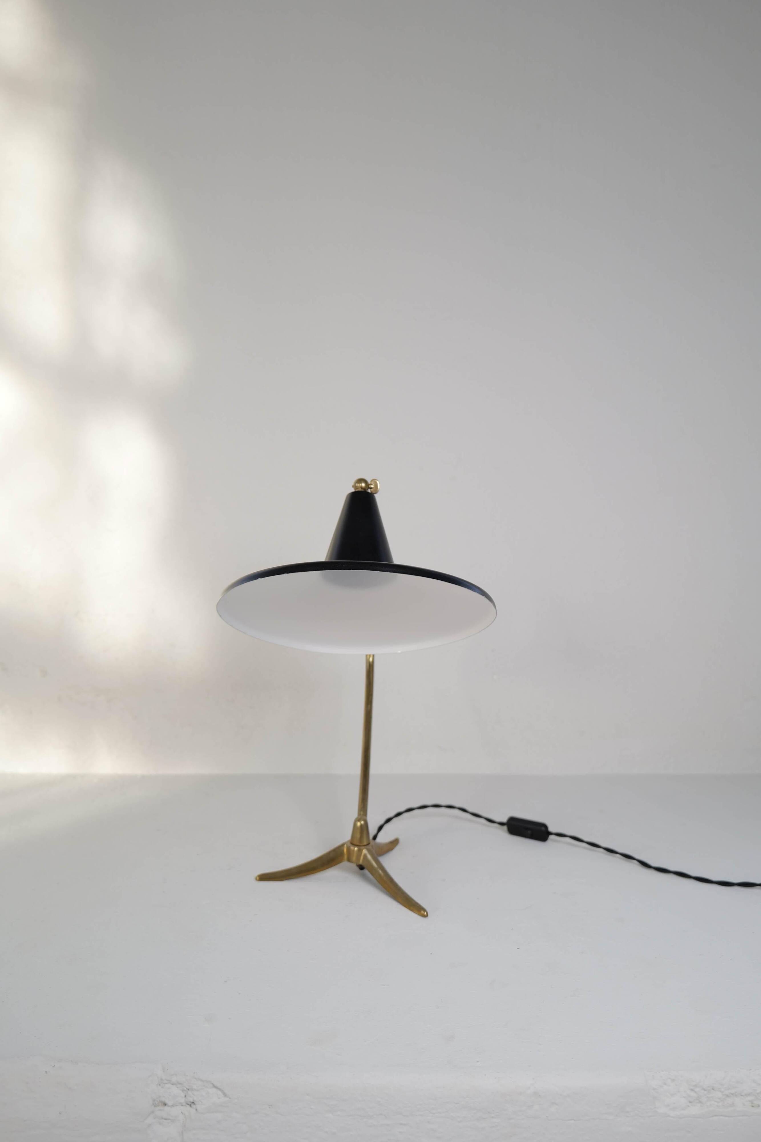 Brass table lamp on a tripod in modern Swedish style, Sweden, 1950.