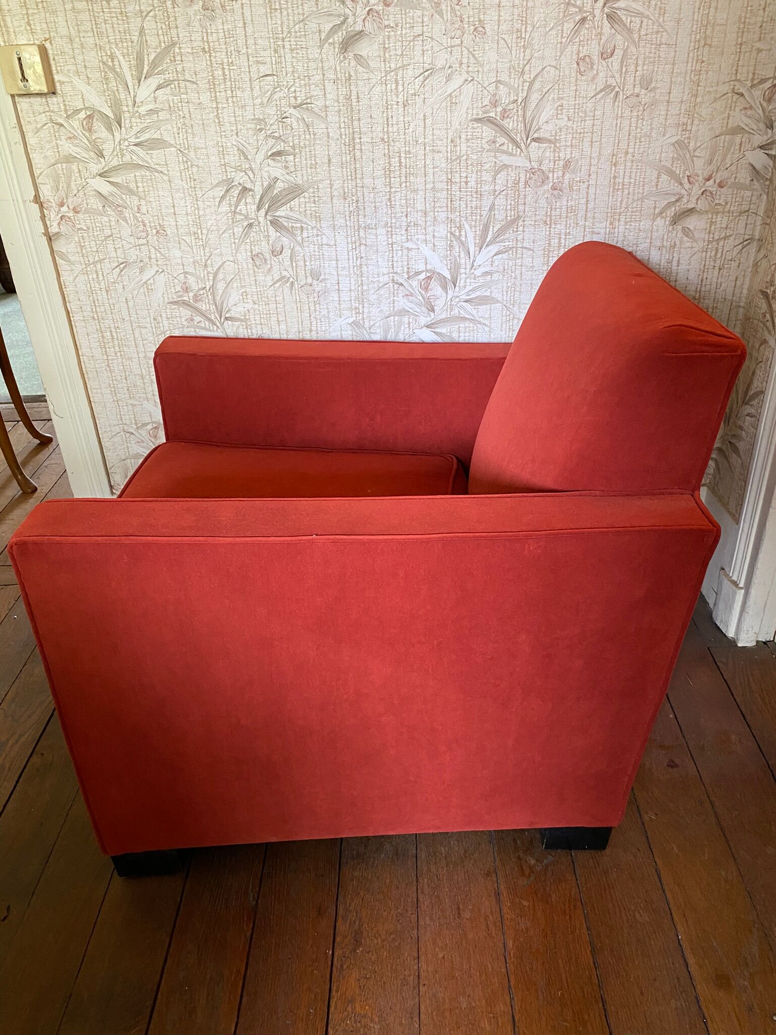 Vintage cubic armchair covered with red fabric