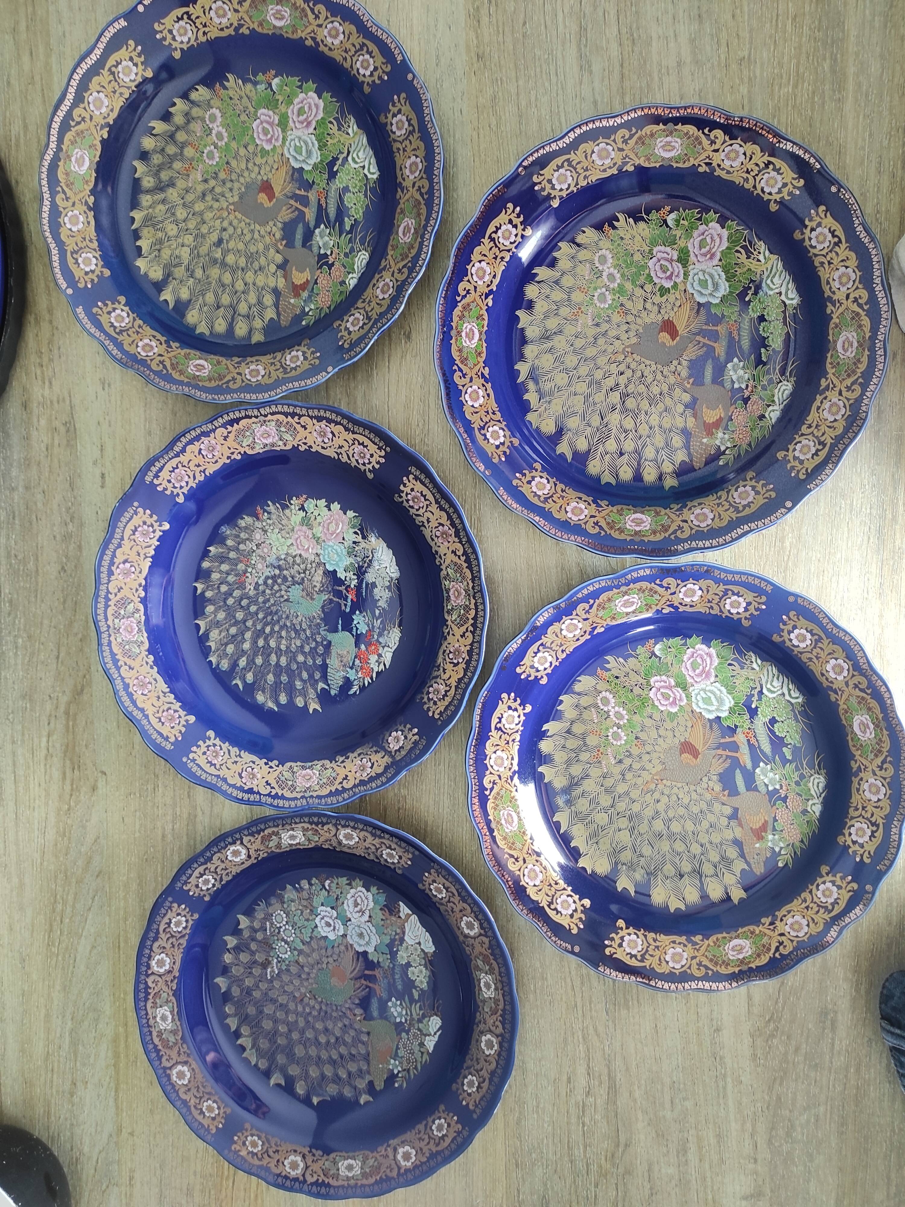 Vintage blue Taous dinnerware set of 21 pieces in very good overall condition.
