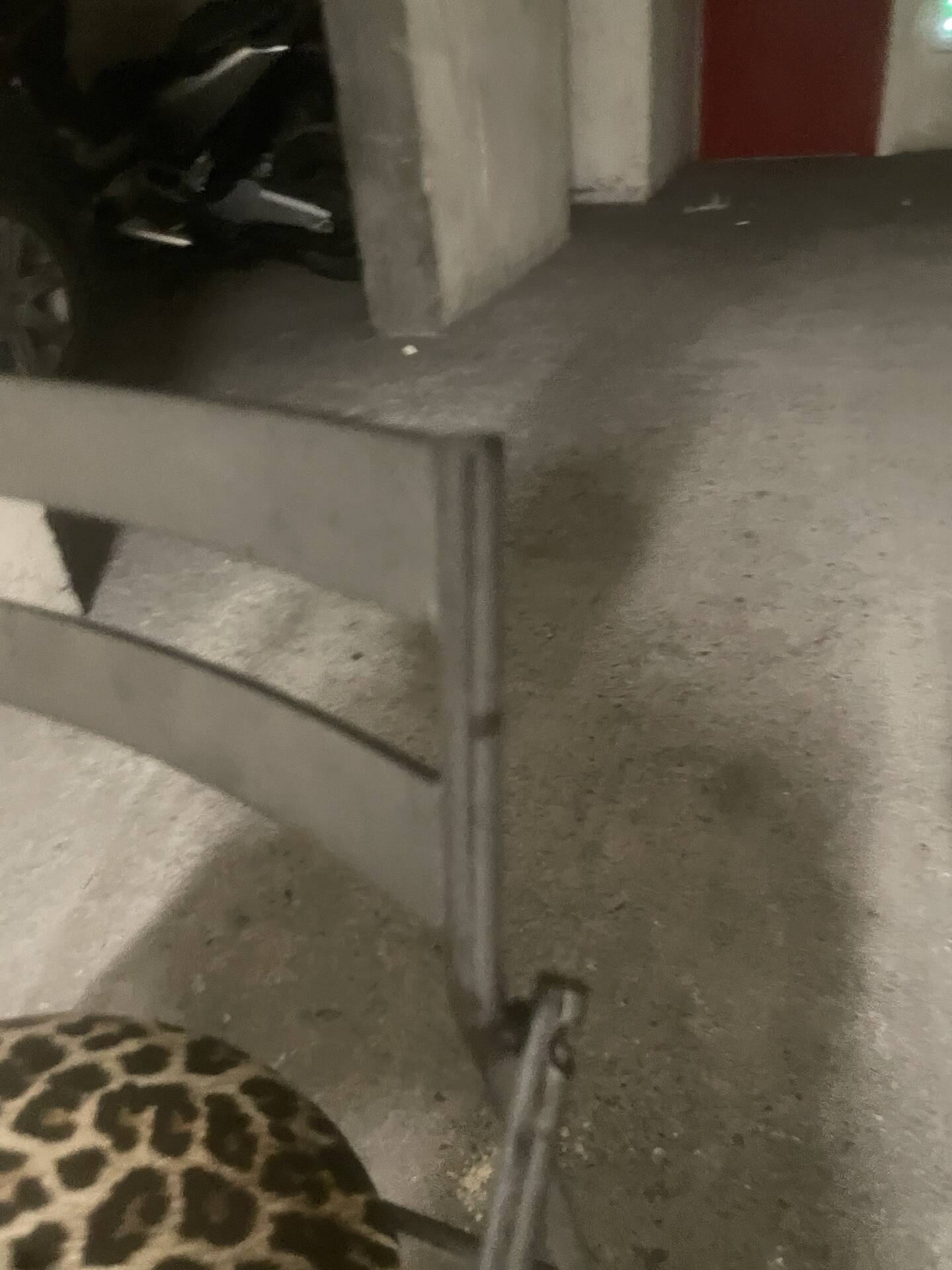 Pair of folding chairs from the 80s with leopard print seats.