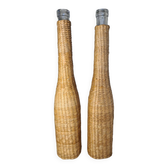 Glass and wicker bottle