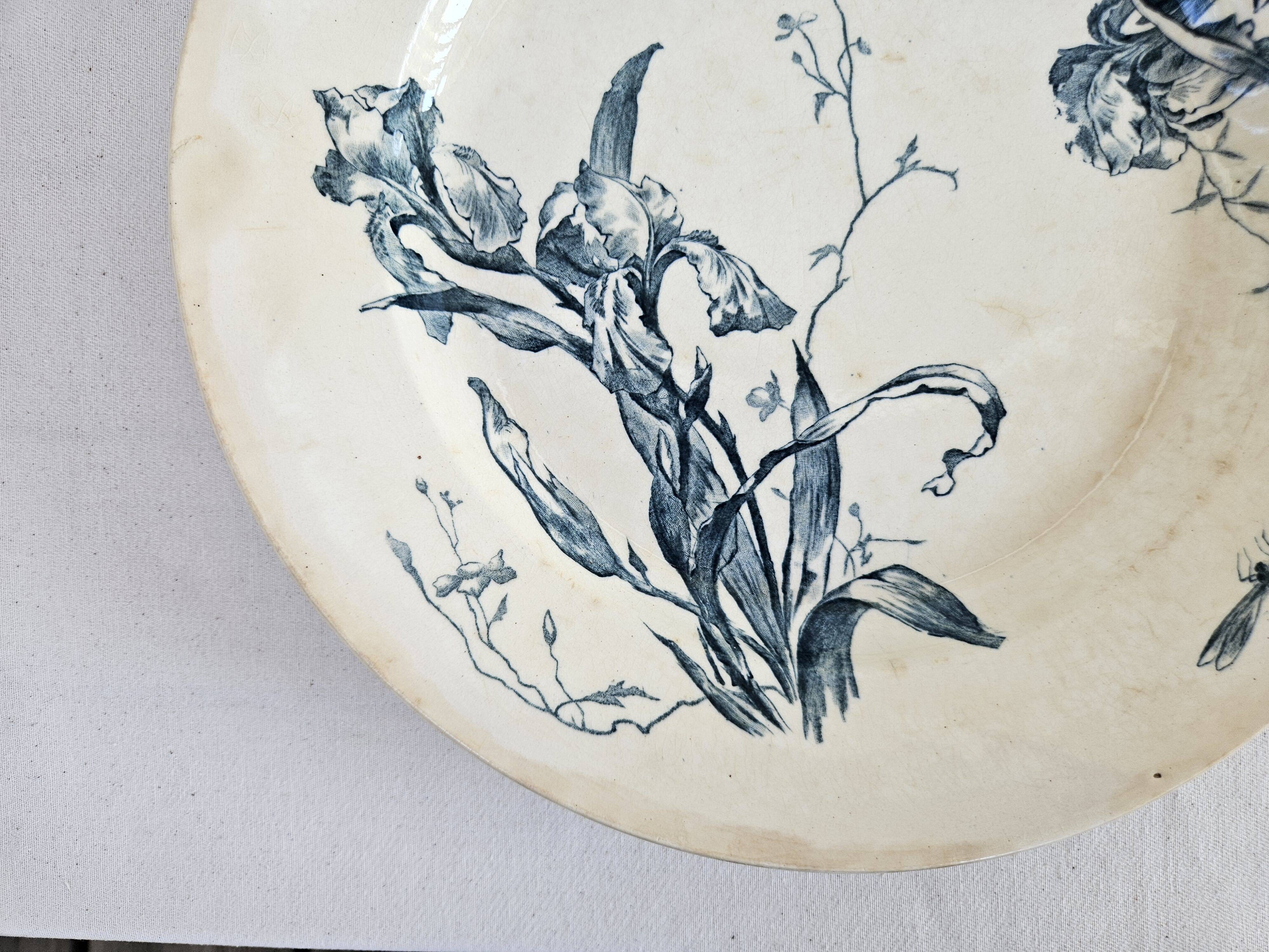 Pair of earthenware dishes from Gien, Iris model, 28 cm