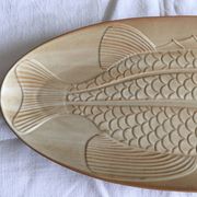 Very large fish dish stamped “Grès CNP Village France”