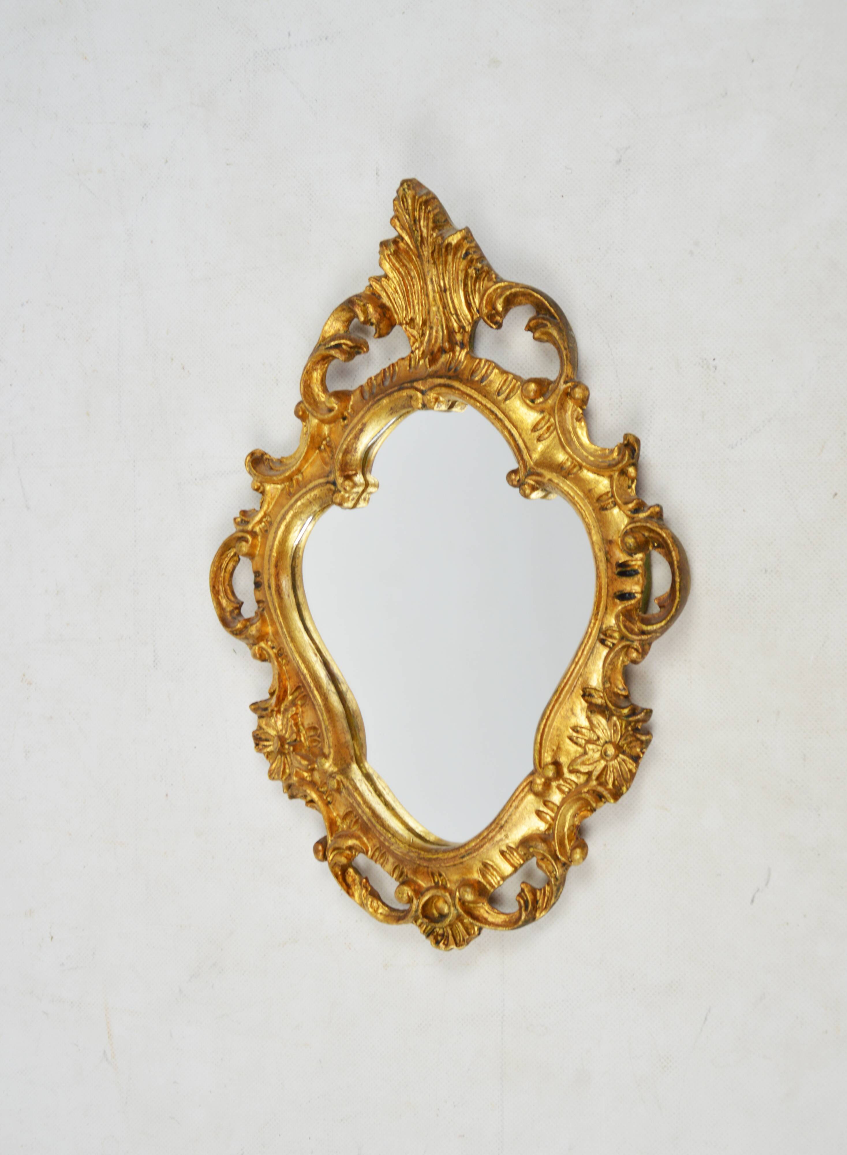 Mirror in a decorative frame, 1970s