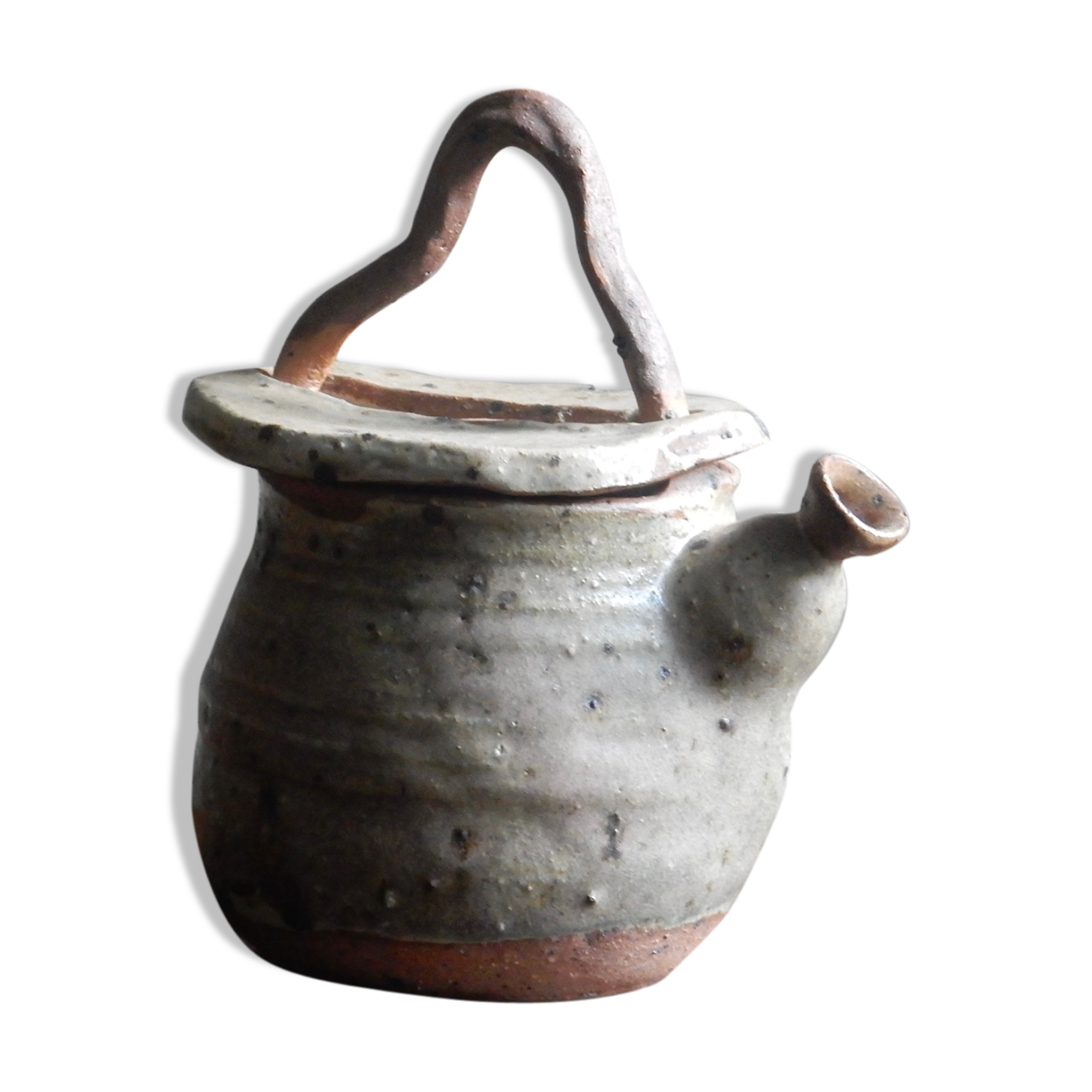 Homemade teapot in pyrity sandstone